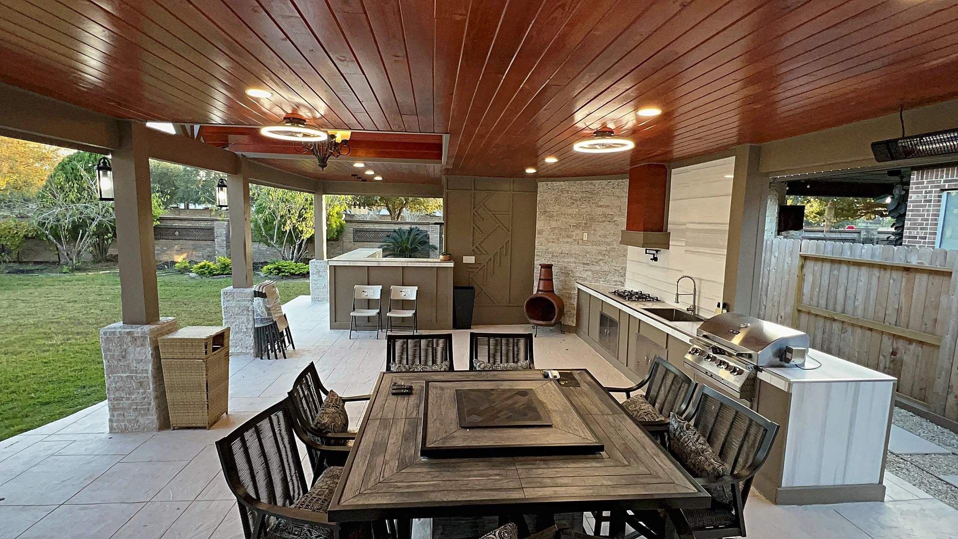 Covered patio construction showcasing quality craftsmanship and custom detailing by a Houston design and build studio.